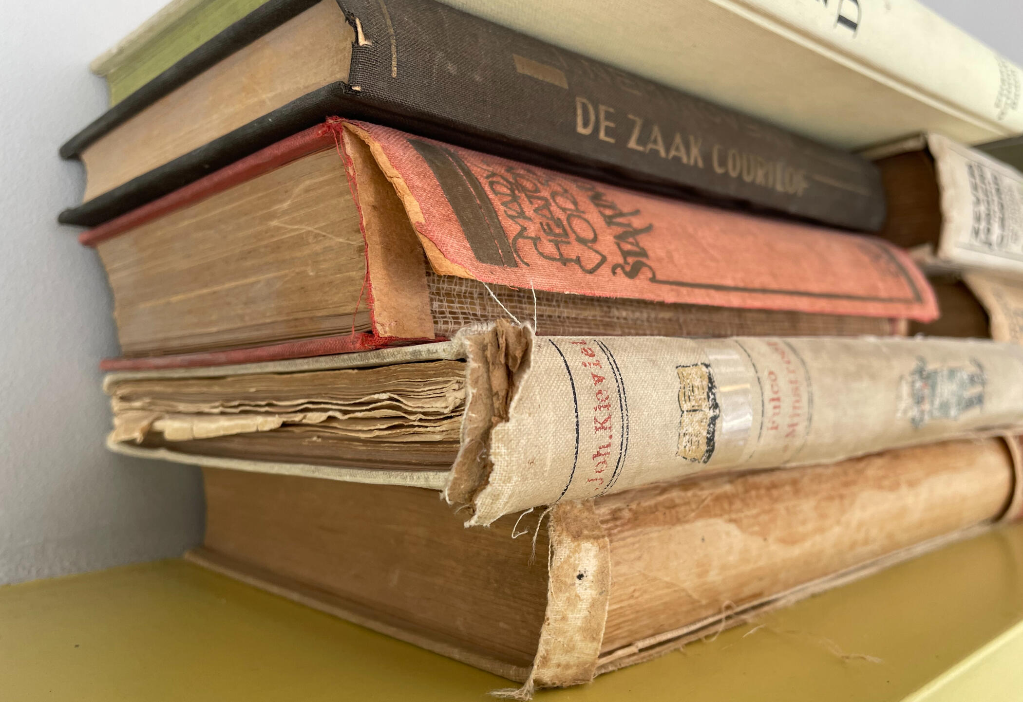 20th century books in need of spine repair